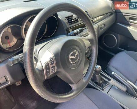 Синий Мазда 3, объемом двигателя 1.6 л и пробегом 191 тыс. км за 5299 $, фото 47 на Automoto.ua