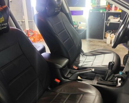 Синий Мазда 3, объемом двигателя 1.35 л и пробегом 220 тыс. км за 5000 $, фото 7 на Automoto.ua