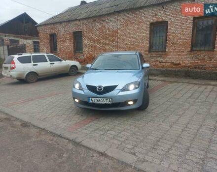 Синий Мазда 3, объемом двигателя 1.6 л и пробегом 203 тыс. км за 5555 $, фото 6 на Automoto.ua