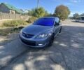 Синій Мазда 3, об'ємом двигуна 2.26 л та пробігом 230 тис. км за 7900 $, фото 1 на Automoto.ua