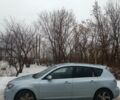 Синий Мазда 3, объемом двигателя 2 л и пробегом 210 тыс. км за 3945 $, фото 2 на Automoto.ua