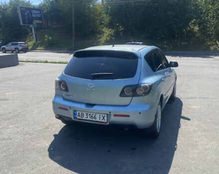 Синій Мазда 3, об'ємом двигуна 1.56 л та пробігом 321 тис. км за 4299 $, фото 5 на Automoto.ua