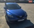 Синий Мазда 3, объемом двигателя 1.35 л и пробегом 235 тыс. км за 4950 $, фото 1 на Automoto.ua
