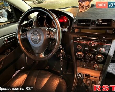 Синий Мазда 3, объемом двигателя 2 л и пробегом 191 тыс. км за 5300 $, фото 7 на Automoto.ua