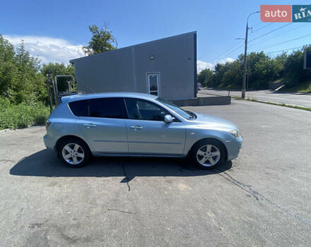 Синій Мазда 3, об'ємом двигуна 1.56 л та пробігом 321 тис. км за 4299 $, фото 4 на Automoto.ua