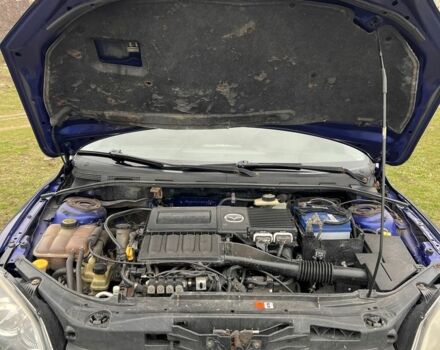 Синий Мазда 3, объемом двигателя 1.6 л и пробегом 357 тыс. км за 4499 $, фото 4 на Automoto.ua