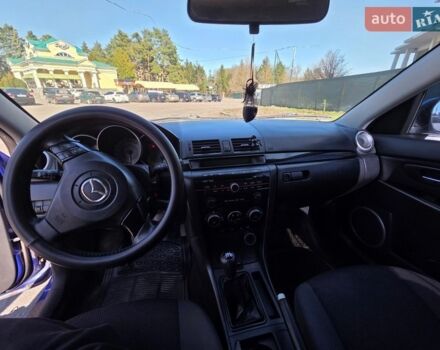 Синий Мазда 3, объемом двигателя 1.35 л и пробегом 235 тыс. км за 4950 $, фото 4 на Automoto.ua