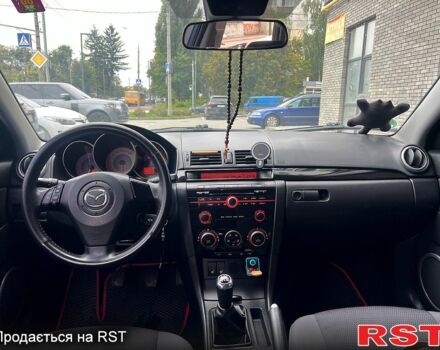 Синій Мазда 3, об'ємом двигуна 1.6 л та пробігом 240 тис. км за 6350 $, фото 3 на Automoto.ua