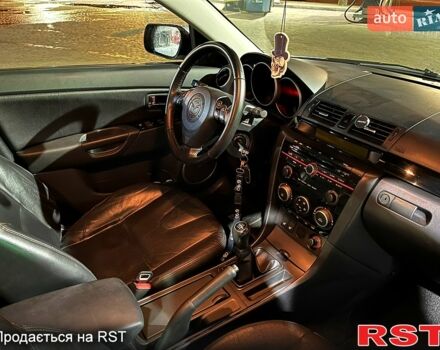Синий Мазда 3, объемом двигателя 2 л и пробегом 191 тыс. км за 5300 $, фото 8 на Automoto.ua