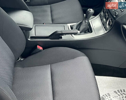 Синий Мазда 3, объемом двигателя 1.6 л и пробегом 189 тыс. км за 6700 $, фото 69 на Automoto.ua