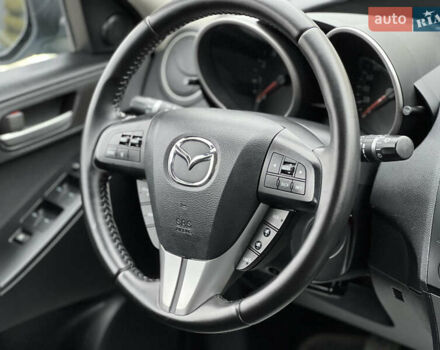 Синий Мазда 3, объемом двигателя 1.6 л и пробегом 189 тыс. км за 6700 $, фото 64 на Automoto.ua