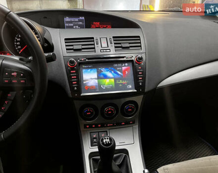 Синий Мазда 3, объемом двигателя 1.6 л и пробегом 162 тыс. км за 8500 $, фото 15 на Automoto.ua