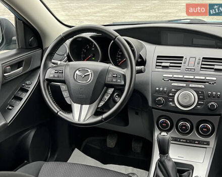 Синий Мазда 3, объемом двигателя 1.6 л и пробегом 189 тыс. км за 6700 $, фото 71 на Automoto.ua