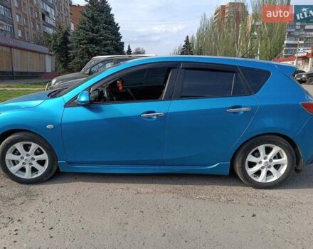 Синий Мазда 3, объемом двигателя 1.6 л и пробегом 148 тыс. км за 4300 $, фото 2 на Automoto.ua