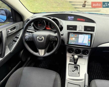 Синий Мазда 3, объемом двигателя 1.6 л и пробегом 226 тыс. км за 8500 $, фото 16 на Automoto.ua