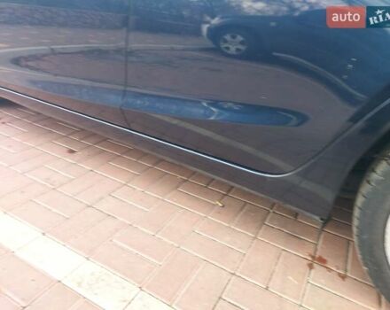 Синий Мазда 3, объемом двигателя 2.19 л и пробегом 200 тыс. км за 14500 $, фото 2 на Automoto.ua