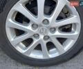 Синий Мазда 3, объемом двигателя 2 л и пробегом 228 тыс. км за 12000 $, фото 9 на Automoto.ua