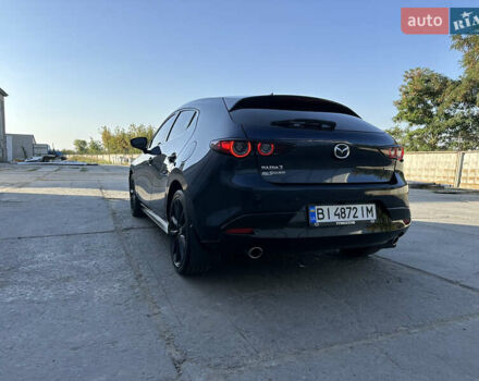 Синий Мазда 3, объемом двигателя 2.49 л и пробегом 99 тыс. км за 15400 $, фото 5 на Automoto.ua