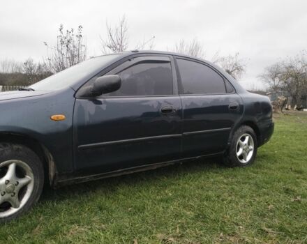 Синий Мазда 3, объемом двигателя 1.5 л и пробегом 260 тыс. км за 1300 $, фото 3 на Automoto.ua