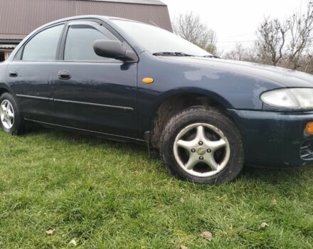 Синий Мазда 3, объемом двигателя 1.5 л и пробегом 260 тыс. км за 1300 $, фото 2 на Automoto.ua