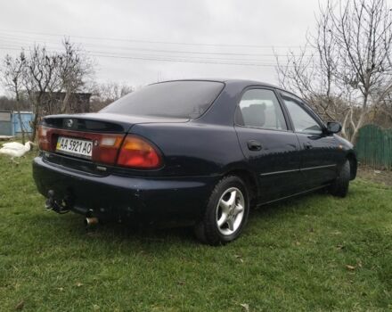 Синий Мазда 3, объемом двигателя 1.5 л и пробегом 260 тыс. км за 1300 $, фото 1 на Automoto.ua