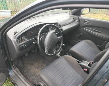 Синий Мазда 3, объемом двигателя 1.5 л и пробегом 260 тыс. км за 1300 $, фото 7 на Automoto.ua