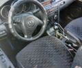 Синій Мазда 3, об'ємом двигуна 1.6 л та пробігом 225 тис. км за 4471 $, фото 4 на Automoto.ua