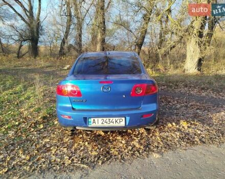 Синий Мазда 3, объемом двигателя 1.6 л и пробегом 220 тыс. км за 4600 $, фото 3 на Automoto.ua