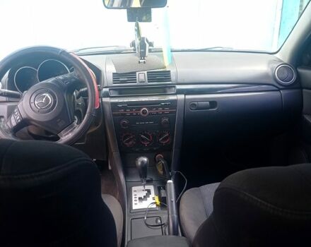 Синий Мазда 3, объемом двигателя 2 л и пробегом 255 тыс. км за 3200 $, фото 6 на Automoto.ua