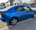 Синий Мазда 3, объемом двигателя 1.6 л и пробегом 323 тыс. км за 3700 $, фото 1 на Automoto.ua