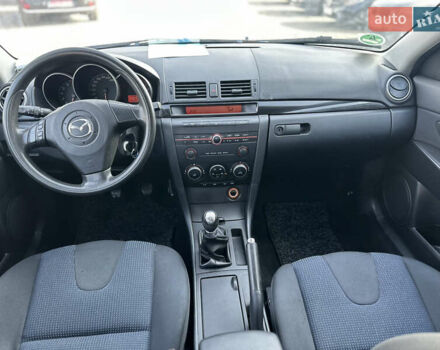 Синий Мазда 3, объемом двигателя 1.6 л и пробегом 205 тыс. км за 4450 $, фото 6 на Automoto.ua