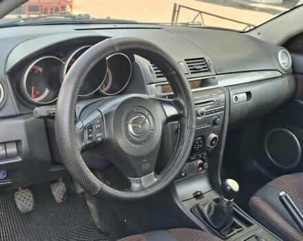 Синий Мазда 3, объемом двигателя 2 л и пробегом 604 тыс. км за 3800 $, фото 5 на Automoto.ua
