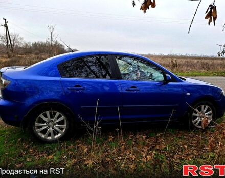 Синій Мазда 3, об'ємом двигуна 1.6 л та пробігом 283 тис. км за 4800 $, фото 3 на Automoto.ua