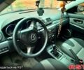 Синий Мазда 3, объемом двигателя 2 л и пробегом 258 тыс. км за 4500 $, фото 1 на Automoto.ua