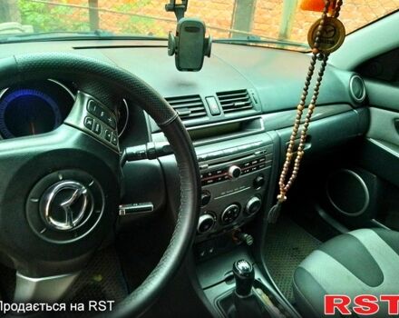 Синий Мазда 3, объемом двигателя 2 л и пробегом 258 тыс. км за 4500 $, фото 7 на Automoto.ua
