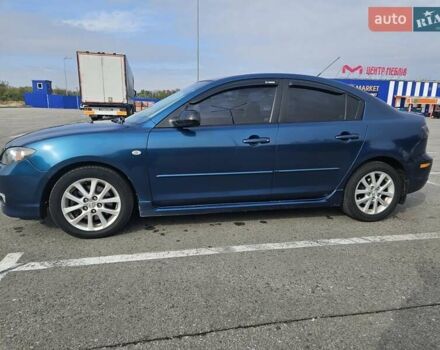 Синій Мазда 3, об'ємом двигуна 2 л та пробігом 301 тис. км за 5700 $, фото 2 на Automoto.ua