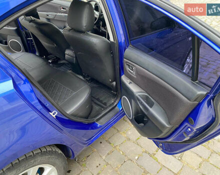 Синий Мазда 3, объемом двигателя 1.6 л и пробегом 214 тыс. км за 5200 $, фото 18 на Automoto.ua