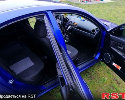 Синий Мазда 3, объемом двигателя 1.6 л и пробегом 197 тыс. км за 4980 $, фото 7 на Automoto.ua