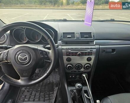 Синій Мазда 3, об'ємом двигуна 2 л та пробігом 301 тис. км за 5700 $, фото 13 на Automoto.ua