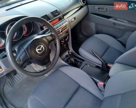 Синий Мазда 3, объемом двигателя 1.6 л и пробегом 219 тыс. км за 5000 $, фото 5 на Automoto.ua