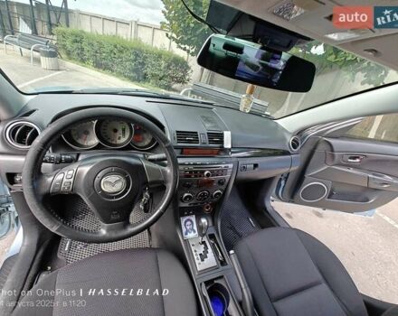 Синий Мазда 3, объемом двигателя 1.6 л и пробегом 206 тыс. км за 5500 $, фото 7 на Automoto.ua