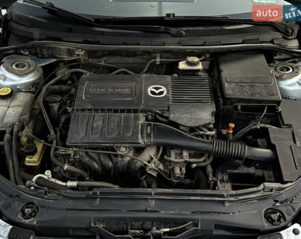 Синий Мазда 3, объемом двигателя 1.6 л и пробегом 144 тыс. км за 4950 $, фото 14 на Automoto.ua
