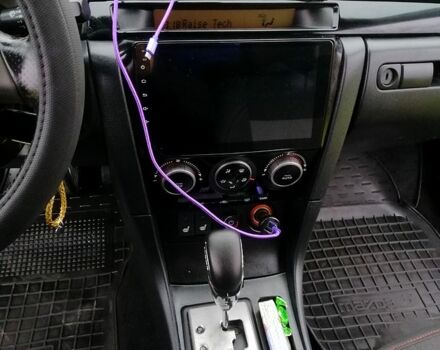 Синий Мазда 3, объемом двигателя 1.6 л и пробегом 197 тыс. км за 4980 $, фото 13 на Automoto.ua