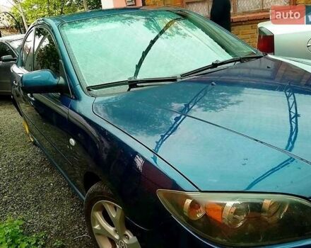 Синій Мазда 3, об'ємом двигуна 2 л та пробігом 258 тис. км за 4500 $, фото 4 на Automoto.ua