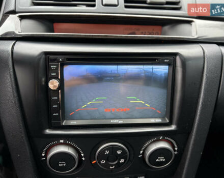 Синій Мазда 3, об'ємом двигуна 1.6 л та пробігом 175 тис. км за 5300 $, фото 31 на Automoto.ua