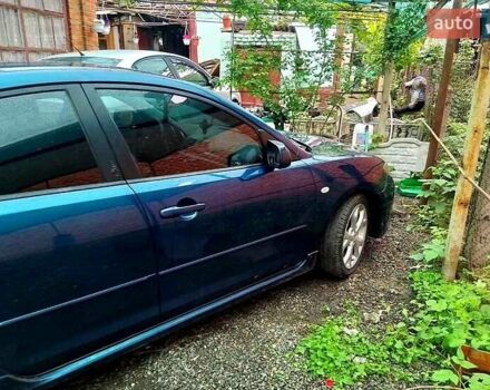 Синій Мазда 3, об'ємом двигуна 2 л та пробігом 258 тис. км за 4500 $, фото 7 на Automoto.ua