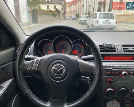 Синий Мазда 3, объемом двигателя 1.6 л и пробегом 214 тыс. км за 5200 $, фото 24 на Automoto.ua