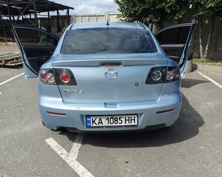 Синий Мазда 3, объемом двигателя 1.6 л и пробегом 206 тыс. км за 5500 $, фото 2 на Automoto.ua
