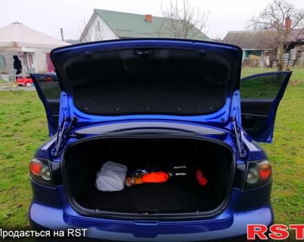Синий Мазда 3, объемом двигателя 1.6 л и пробегом 197 тыс. км за 4980 $, фото 8 на Automoto.ua