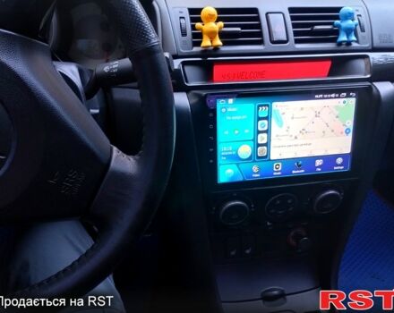 Синий Мазда 3, объемом двигателя 1.6 л и пробегом 160 тыс. км за 6000 $, фото 5 на Automoto.ua